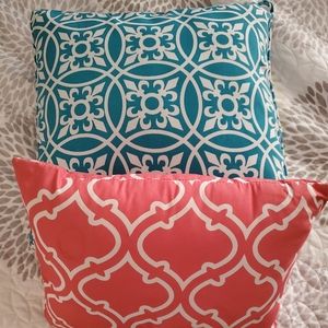 Turquoise and burnt orange decorative pillows